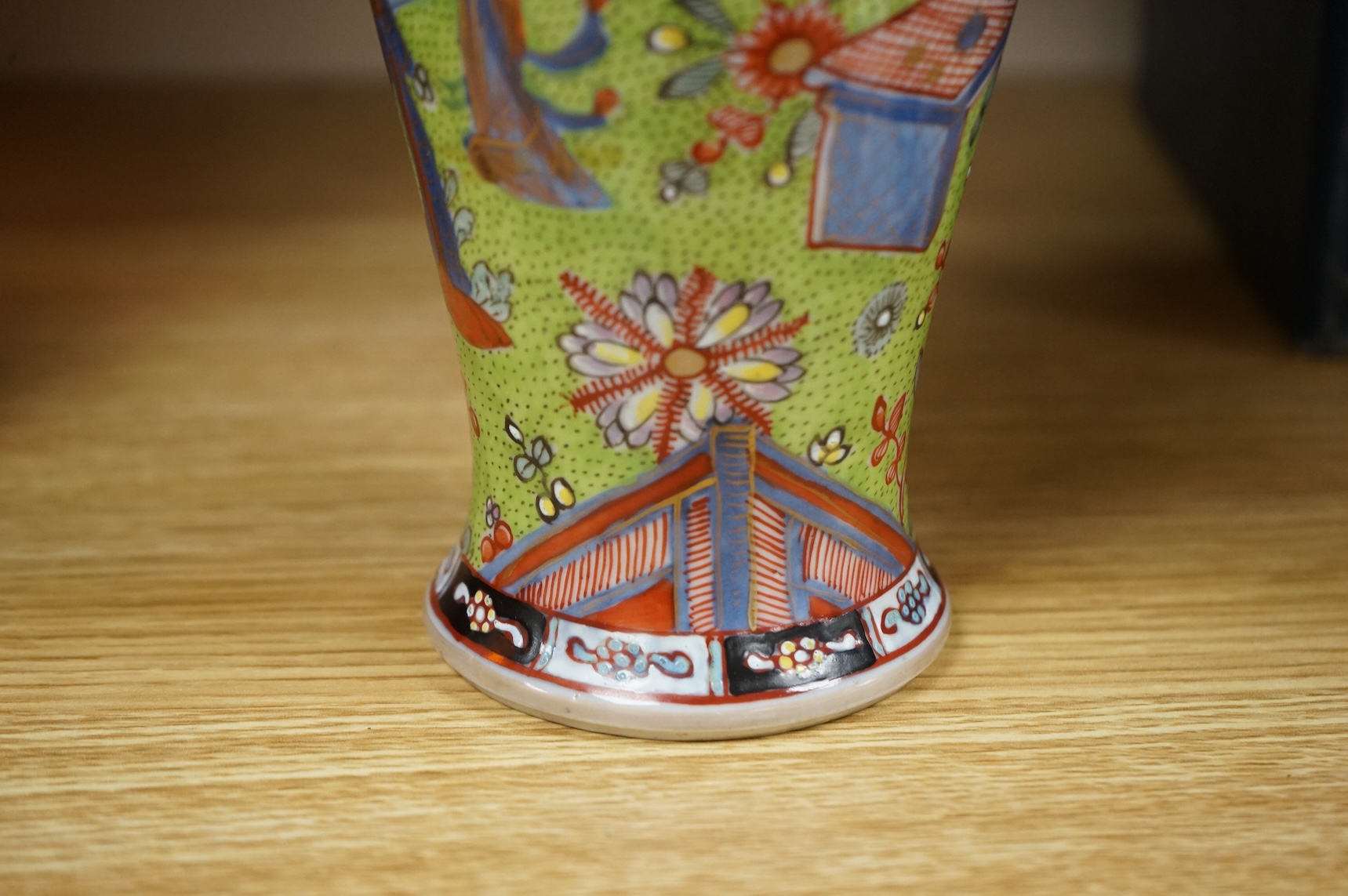 An 18th century Chinese clobbered vase, 20cm high